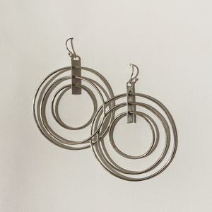 
            
                Load image into Gallery viewer, Saturn Hoops earrings Salt and Steel Jewelry 
            
        